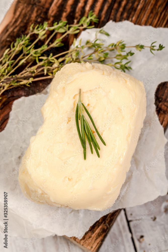 butter on rustic wooden background. Background image. Copy space butter on rustic wooden background. Background image. Copy space