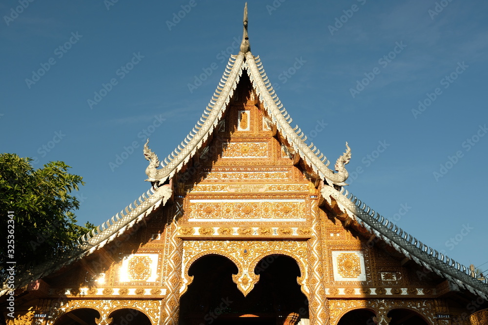 Chiang Mai Thailand - Temple area Chiang Man roofs in early morning