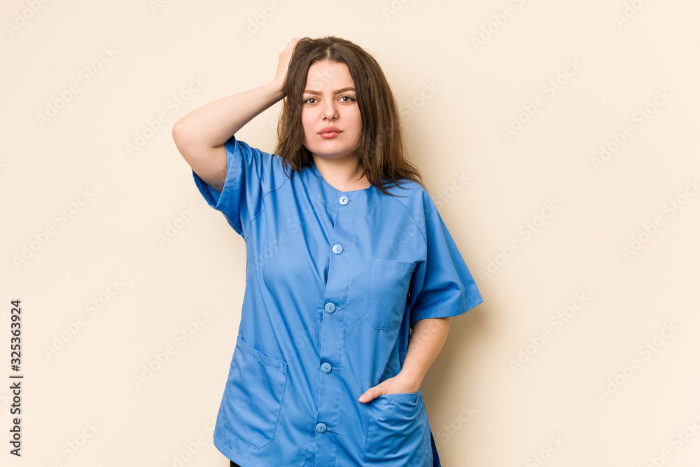 Young curvy nurse woman being shocked, she has remembered important meeting. Young curvy nurse woman being shocked, she has remembered important meeting.