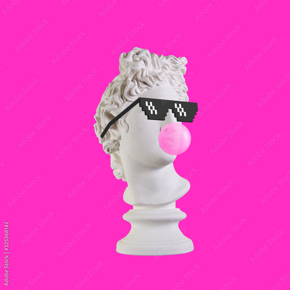Statue on a pink background. Gypsum statue of Apollo head. Man. Creative. Plaster statue of Apollo head in pixel glasses. Minimal concept art.