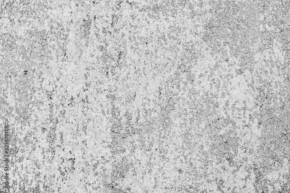 Texture of a metal wall with cracks and scratches which can be used as a background Texture of a metal wall with cracks and scratches which can be used as a background