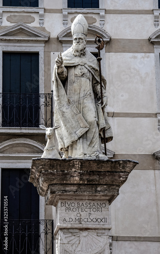 Bassano del Grappa, Veneto / Italy - August 13th, 2008: Statue of San Bassiano in Piazza Liberta, the patron saint and protector of the town. photo