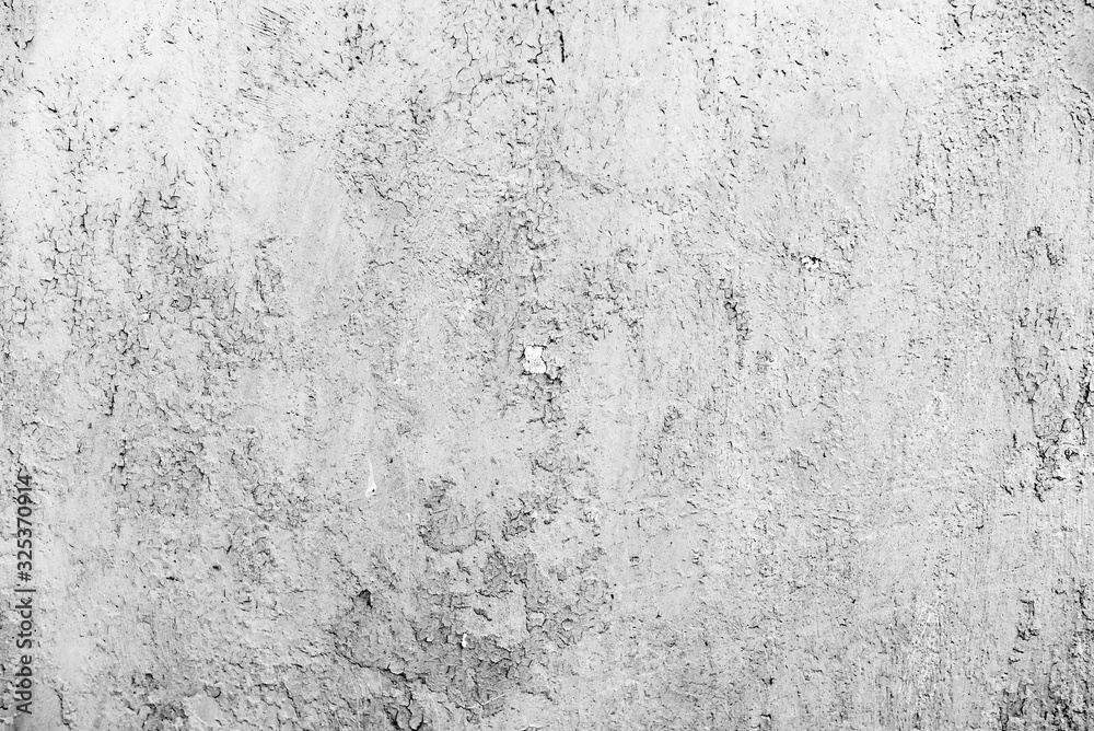 Texture of a metal wall with cracks and scratches which can be used as a background Texture of a metal wall with cracks and scratches which can be used as a background
