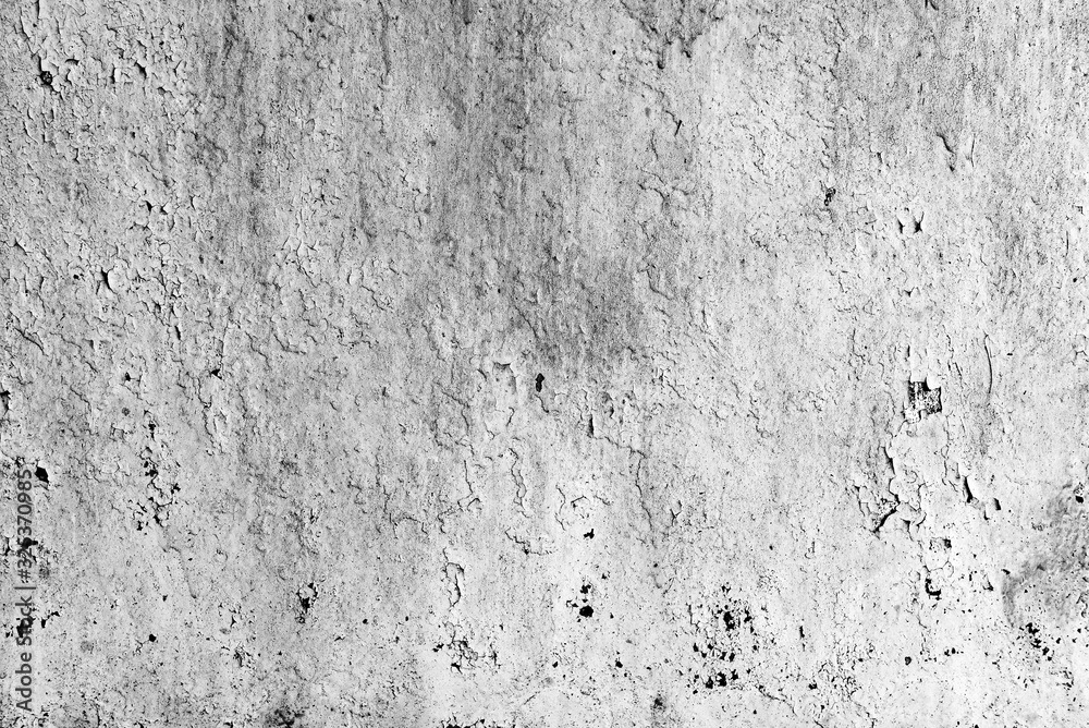 Texture of a metal wall with cracks and scratches which can be used as a background