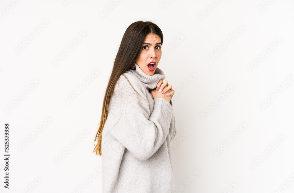 Young caucasian woman isolated on a white background scared and afraid. Young caucasian woman isolated on a white background scared and afraid.