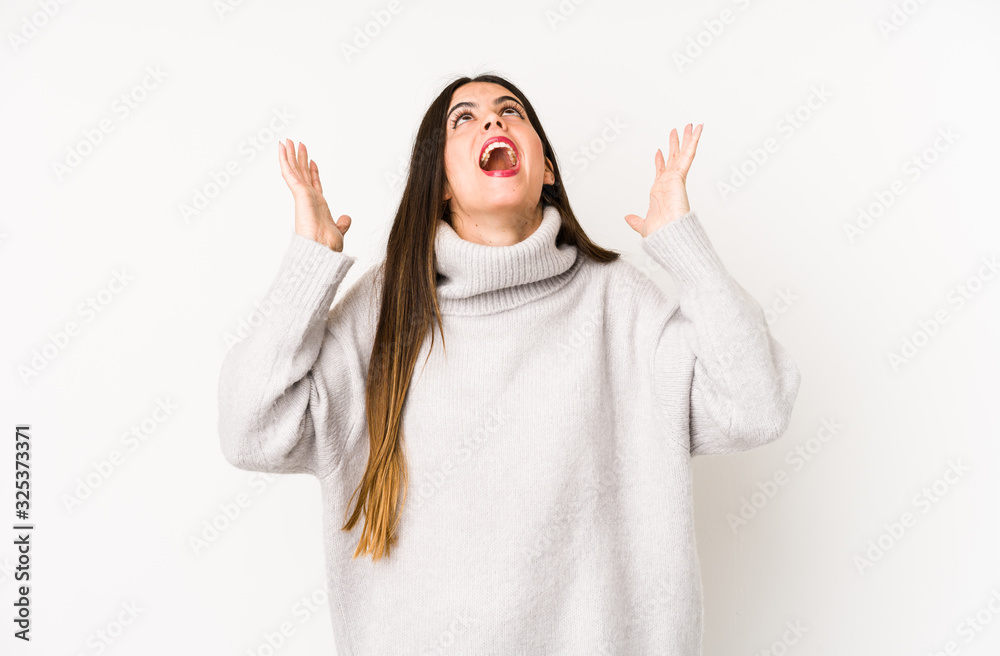 Young caucasian woman isolated on a white background screaming to the sky, looking up, frustrated. Young caucasian woman isolated on a white background screaming to the sky, looking up, frustrated.