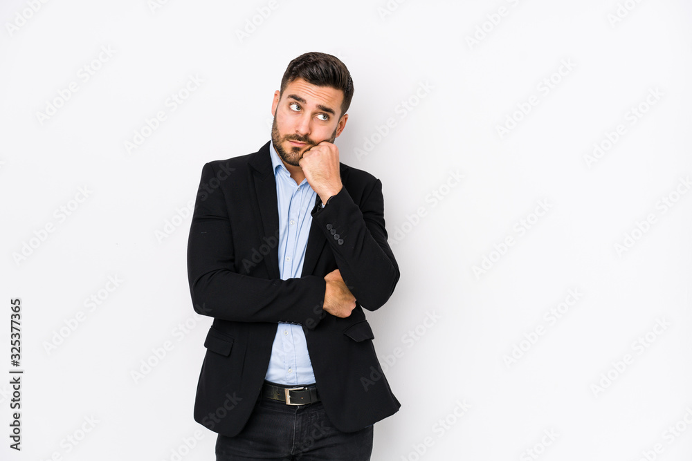 Young caucasian business man against a white background isolated who feels sad and pensive, looking at copy space. Young caucasian business man against a white background isolated who feels sad and pensive, looking at copy space.