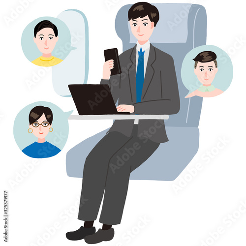 新幹線 飛行機でチャットをするスーツ姿の男性