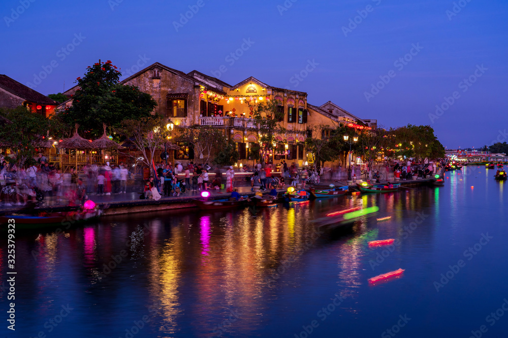 Light trails of passenger boats at Hoi An, Vietnam