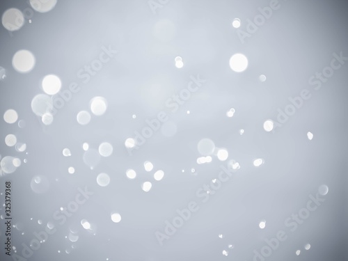 Abstract bokeh lights with soft light background.