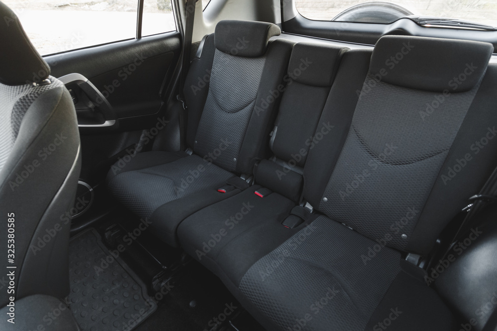 Car interior, part of back seats, close