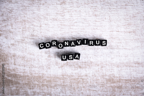 Concept coronavirus,MERS-Cov middle East respiratory syndrome coronavirus.Covid 19 originating in Wuhan, China.Inscription .Syringe and blood on wooden table.