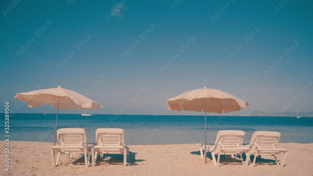 Sunchairs prepared for tourists on beach resort Sunchairs prepared for tourists on beach resort