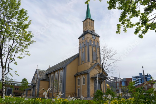 Tromso / Norway - June 12, 2019: Tromso Cathedral (Norwegian: Tromso¸ domkirke) is a cathedral in the city of Tromso in Troms county, Norway. Founded 1252, completed 1861.