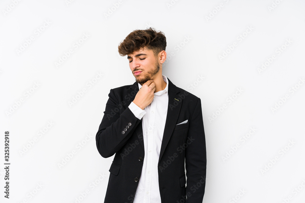 Young arabian business man isolated suffers pain in throat due a virus or infection. Young arabian business man isolated suffers pain in throat due a virus or infection.