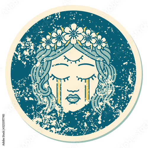 distressed sticker tattoo style icon of female face crying with third eye