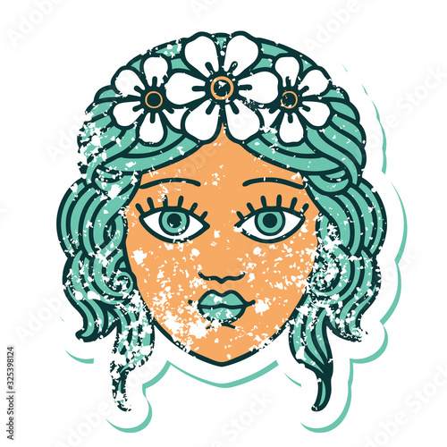 distressed sticker tattoo style icon of female face with crown of flowers