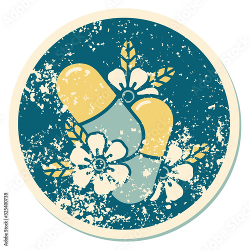 distressed sticker tattoo style icon of pills and flowers