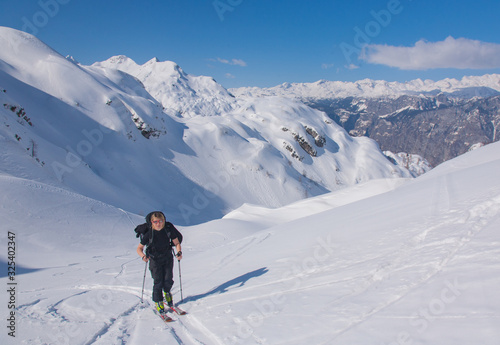 Woman ski touring © Uroš Medved