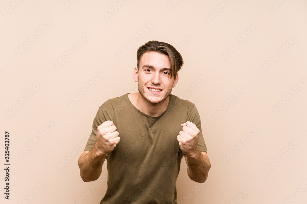 Young caucasian man posing isolated cheering carefree and excited. Victory concept. Young caucasian man posing isolated cheering carefree and excited. Victory concept.