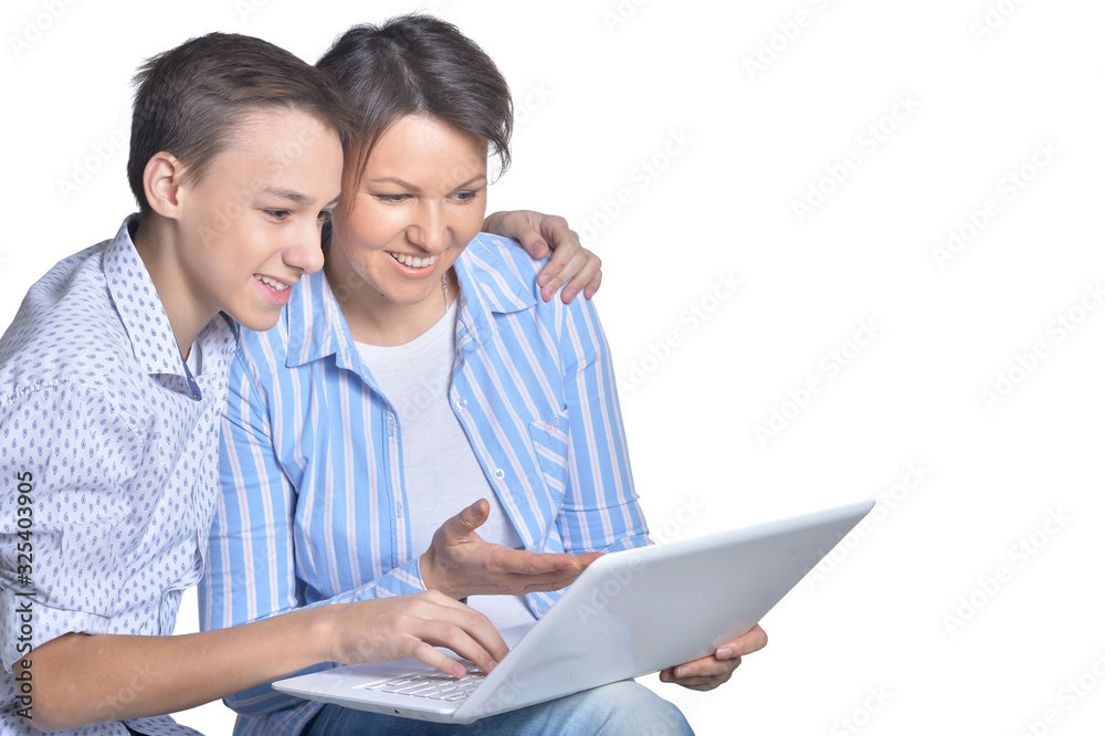 Portrait of fine family with laptop on a white background Portrait of fine family with laptop on a white background