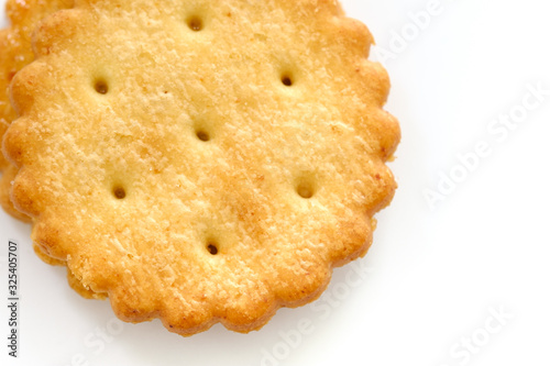 Stack of sweetmeal digestive biscuits isolated on white background photo