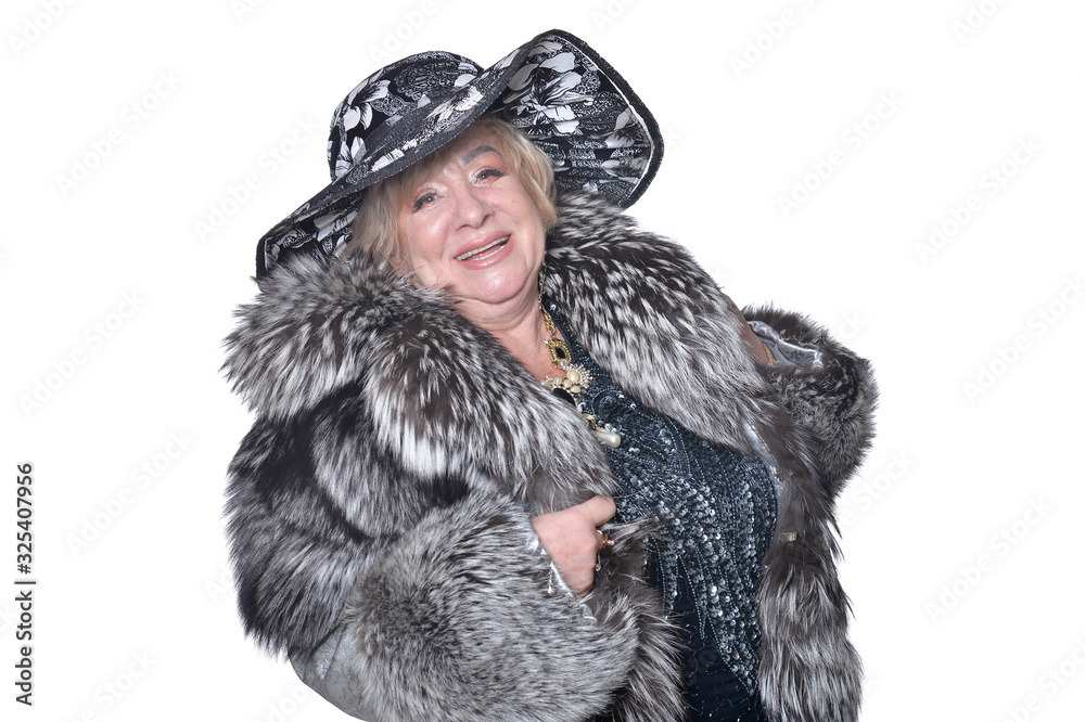 Portrait of senior woman wearing black hat and fur coat Portrait of senior woman wearing black hat and fur coat