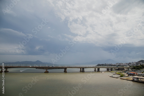 View of Florianopolis bay and downtown with the two main Bridges connecting to mainland, Colombo Salles and Pedro Ivo Campos bridges.  © hansdenis