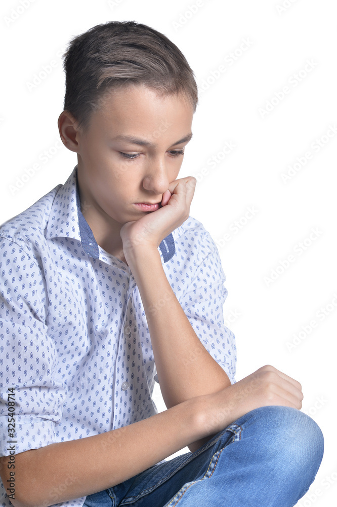 Portrait of studio portrait of sad teenage boy Portrait of studio portrait of sad teenage boy