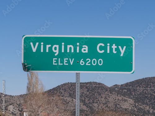 Road sign showing the elevation of Virginia City Nevada