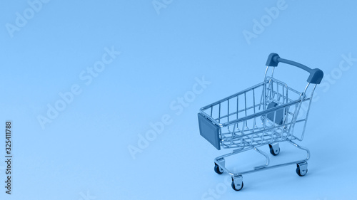 Supermarket trolley, shopping concept, Panton 2020 colour, classic blue