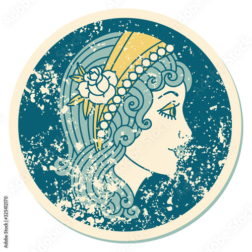distressed sticker tattoo style icon of a gypsy head