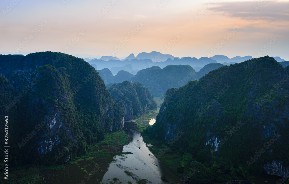 Aerial view at sunset of Ninh Binh region, Tam Coc valley tourist ...