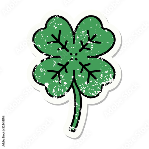 traditional distressed sticker tattoo of a 4 leaf clover