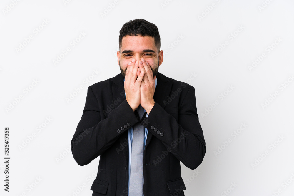 Young latin business woman against a white background isolated laughing about something, covering mouth with hands. Young latin business woman against a white background isolated laughing about something, covering mouth with hands.