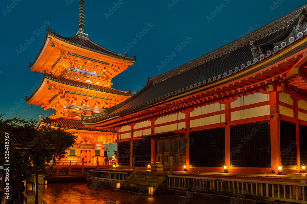 Japan. Kyoto. Kiyomizu Dera temple with evening lighting. Temple of pure water in Japan. Traditional Japanese architecture. Buddhism. Shinto. Iconic buildings of Japan. Japanese culture. Japan. Kyoto. Kiyomizu Dera temple with evening lighting. Temple of pure water in Japan. Traditional Japanese architecture. Buddhism. Shinto. Iconic buildings of Japan. Japanese culture.