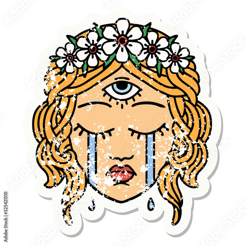traditional distressed sticker tattoo of female face with third eye crying