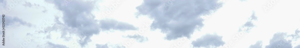 Blurry fluffy clouds floating in the sky Blurry fluffy clouds floating in the sky
