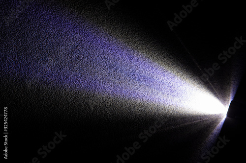 unfocused texture concept picture in rays of light from lantern space with shadow frame