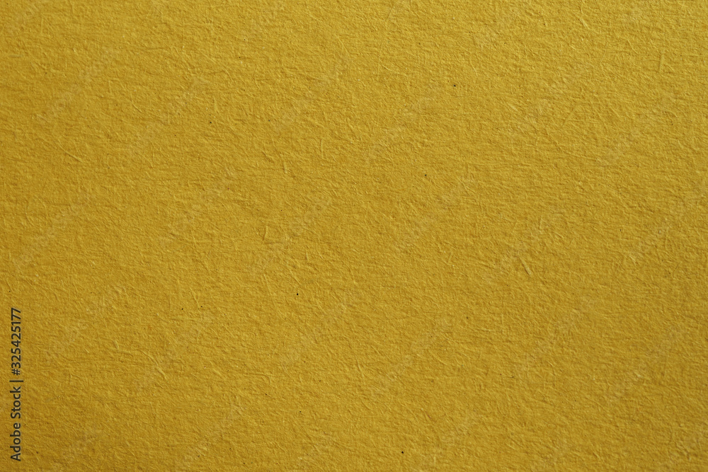 texture texture of yellow handmade paper in macro texture texture of yellow handmade paper in macro