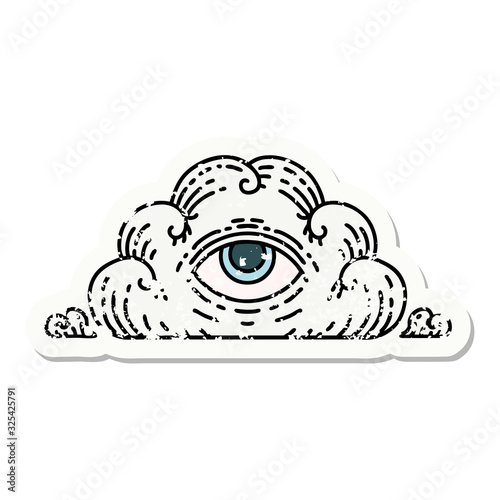 traditional distressed sticker tattoo of an all seeing eye cloud
