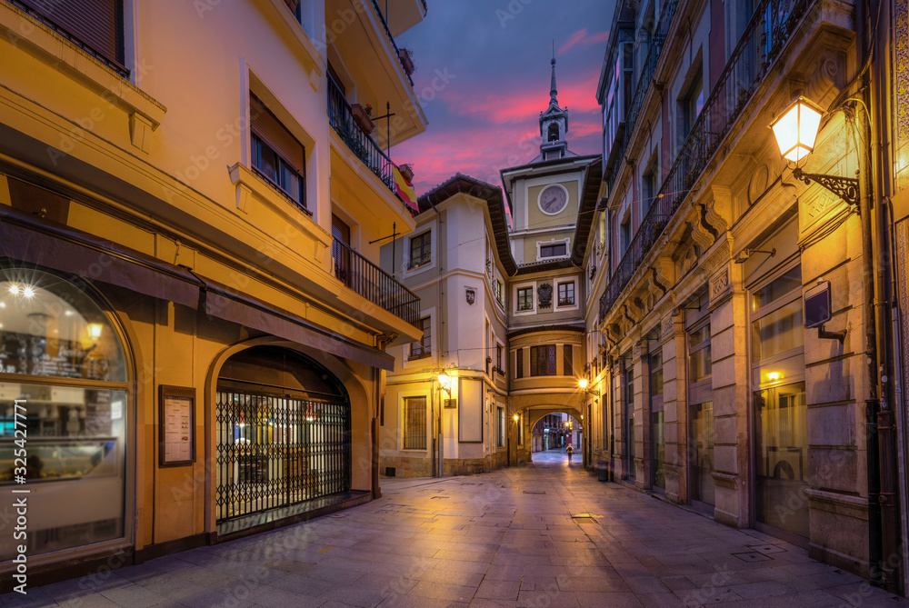 Oviedo, Spain. Clock Tower of Town Hall at dusk - obrazy, fototapety, plakaty 