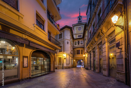 Oviedo, Spain. Clock Tower of Town Hall at dusk