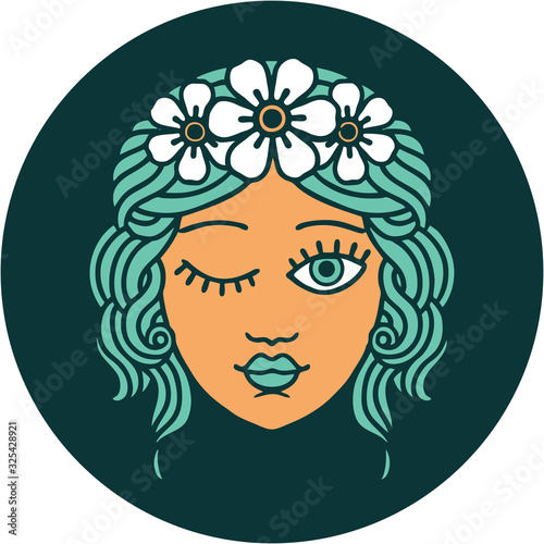 tattoo style icon of a maidens face winking