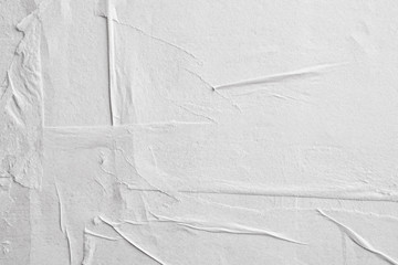 Blank white crumpled and creased paper poster texture background