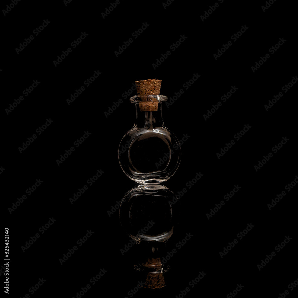 Glass test tubes with liquid isolated on a black background. Glass test tubes with liquid isolated on a black background.