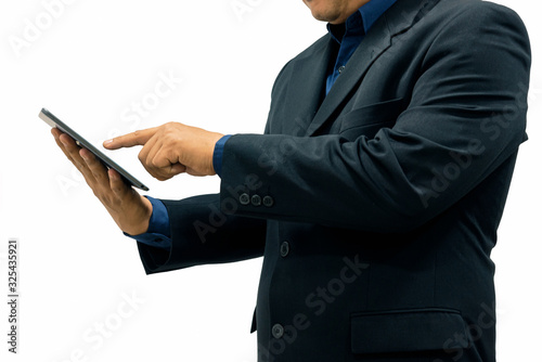 Businessman using tablet with white background.