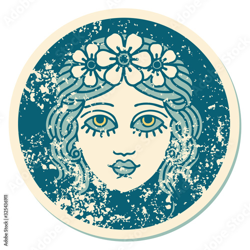 distressed sticker tattoo style icon of female face with crown of flowers