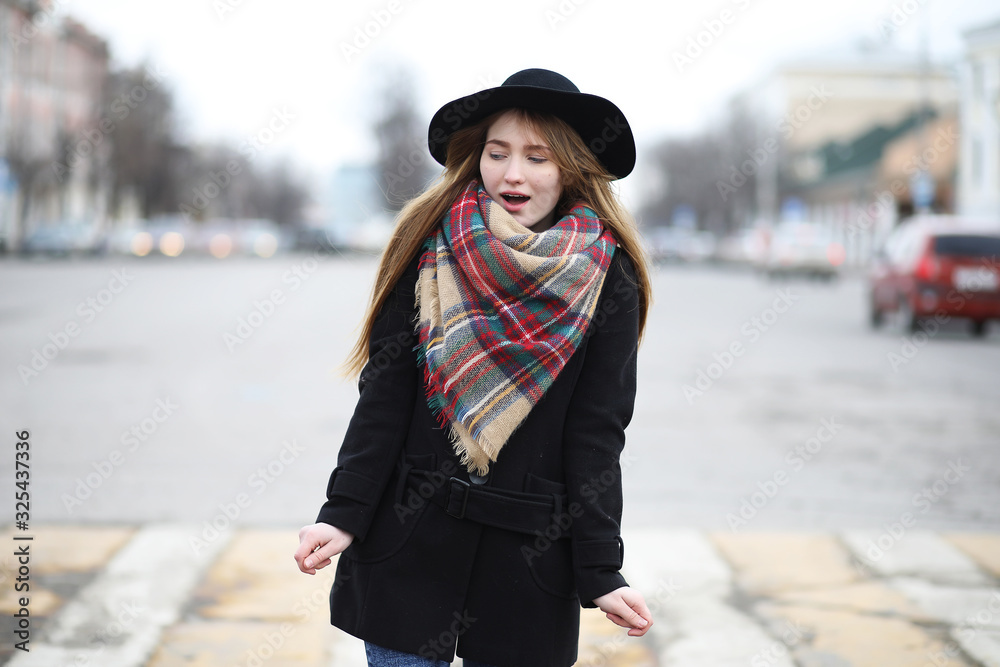 French woman for a walk in early spring