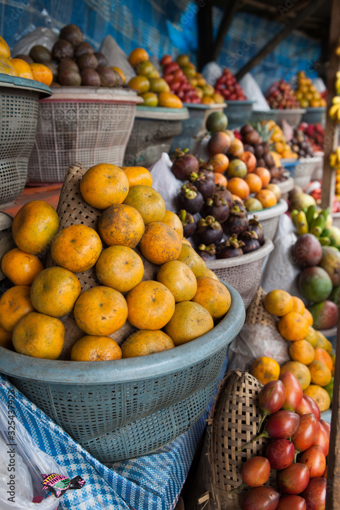 Open air fruit market in Indonesian village.